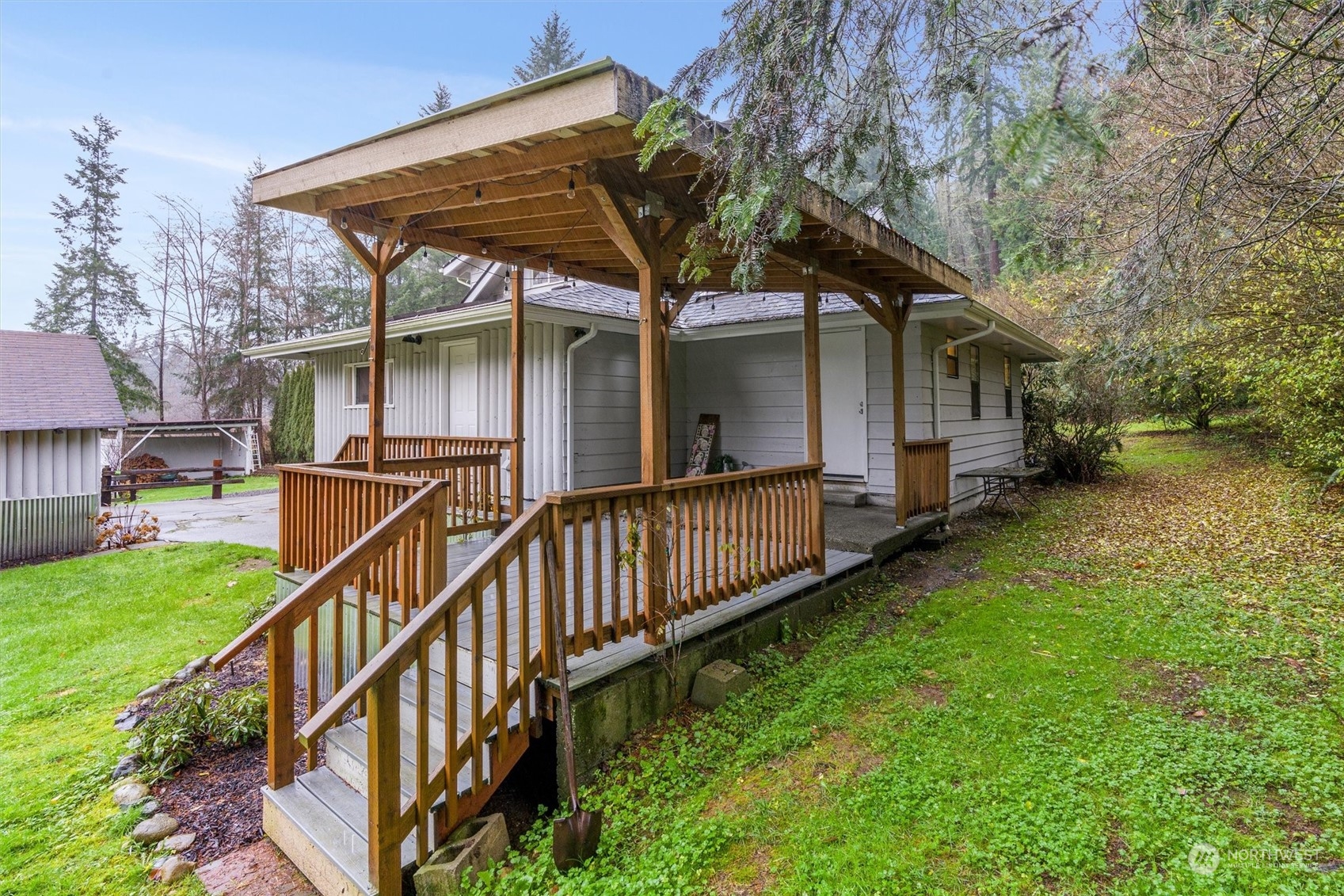 7526 Spada Road Snohomish, WA 98290 - Photo 32 of 40 a view of a house with backyard and sitting area