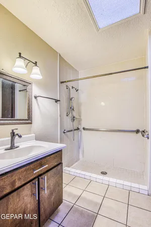 a bathroom with a shower and a shower
