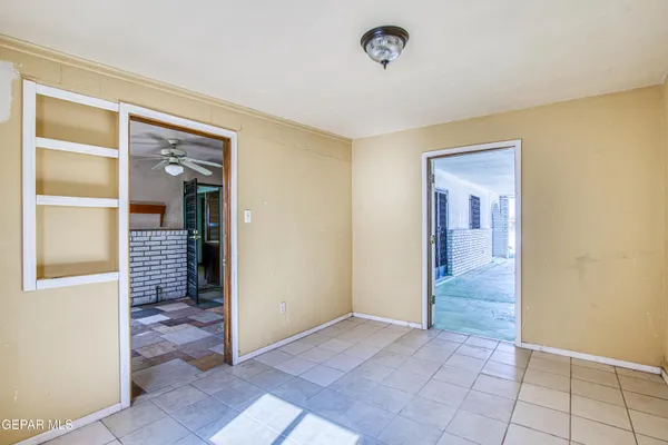 a view of a hallway with washer and dryer