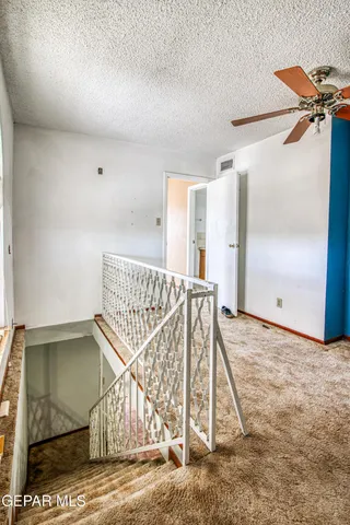 a view of a hallway with closet
