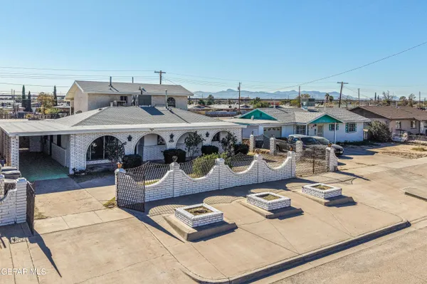 a view of a terrace with furniture and stove