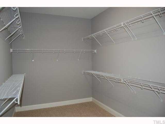6912 Johnson Mill Road Bahama, NC 27503 - Photo 8 of 12 a view of a room with racks on the wall