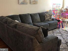 3934 Bel Pre Road, Unit 39344 Silver Spring, MD 20906 - Photo 4 of 28 Living room with Baby corner