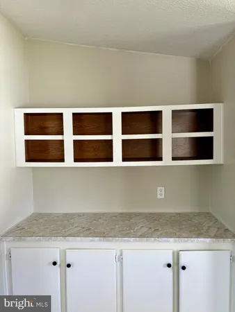 a view of room with microwave