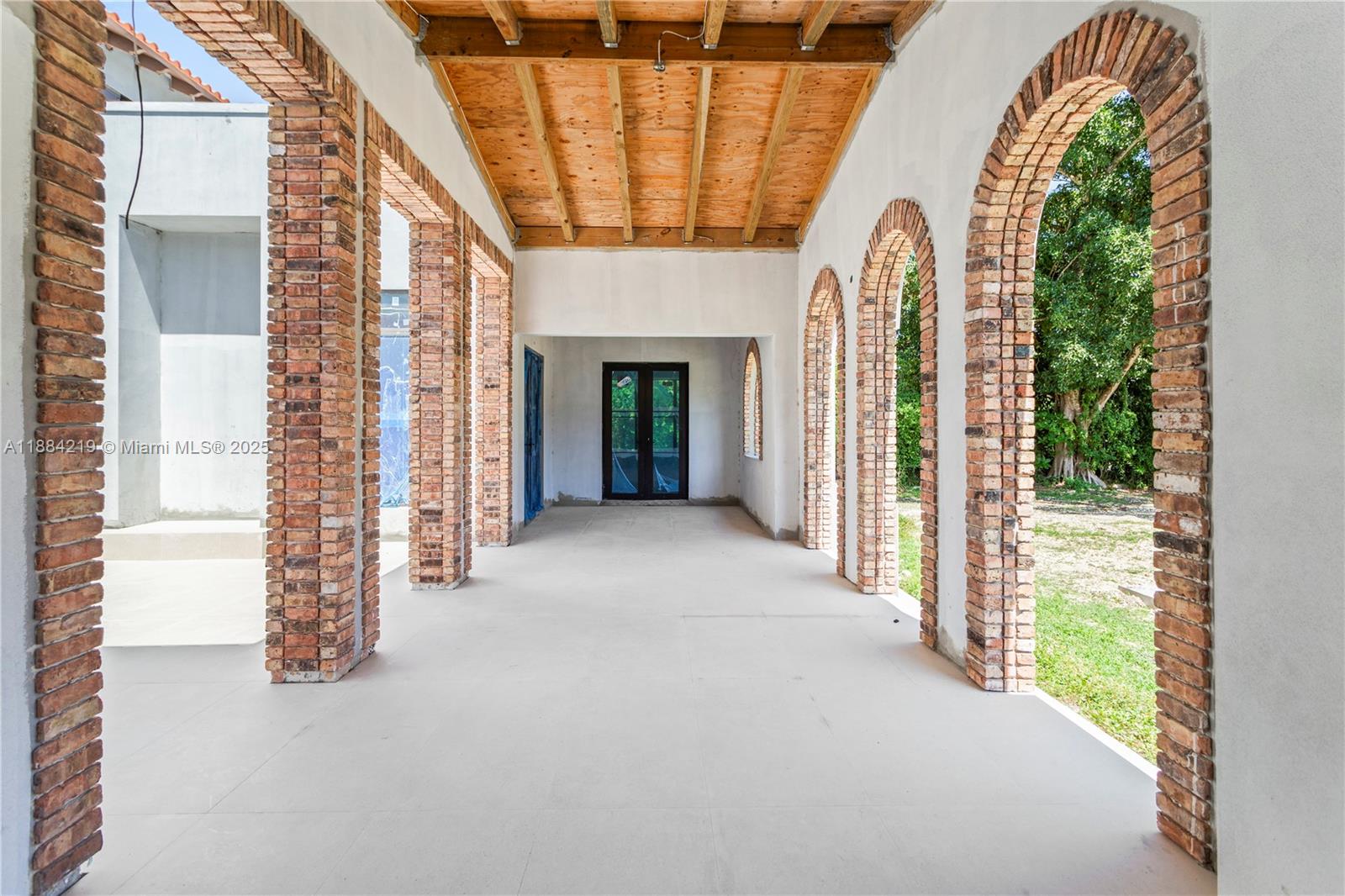 6460 Southwest 94th Street Pinecrest, FL 33156 - Photo 9 of 43 a view of an entryway with a livingroom