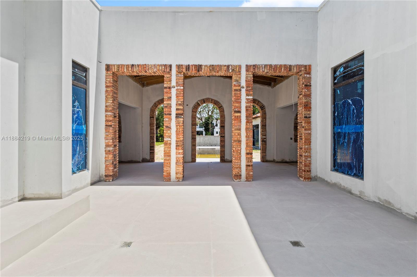 6460 Southwest 94th Street Pinecrest, FL 33156 - Photo 10 of 43 a view of a big room with mirror and closet
