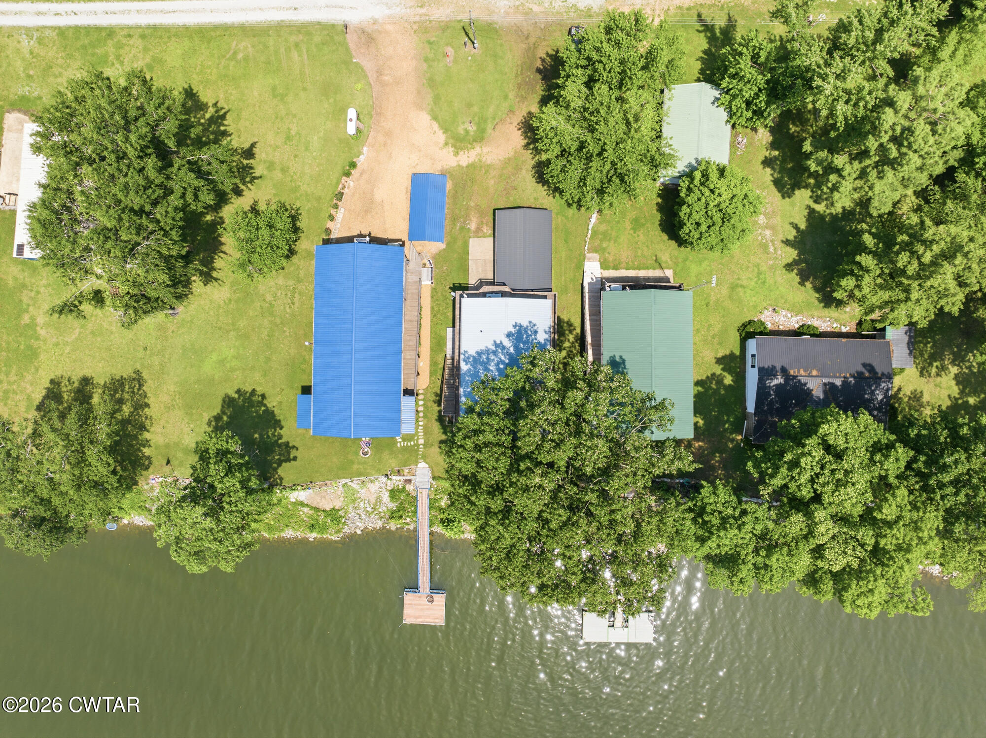 1728 Yarbro Landing Lane Decaturville, TN 38329 - Photo 40 of 44 a view of a house with a lake
