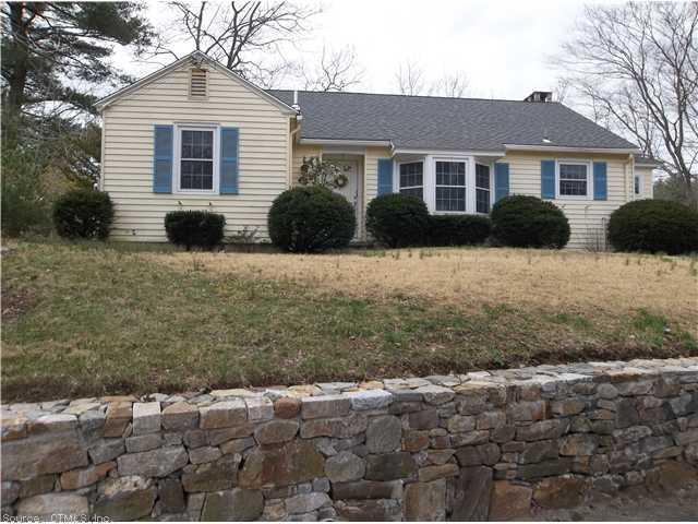 28 Echo Point Road Guilford, CT 06437 - Photo 1 of 1 a front view of a house with a yard