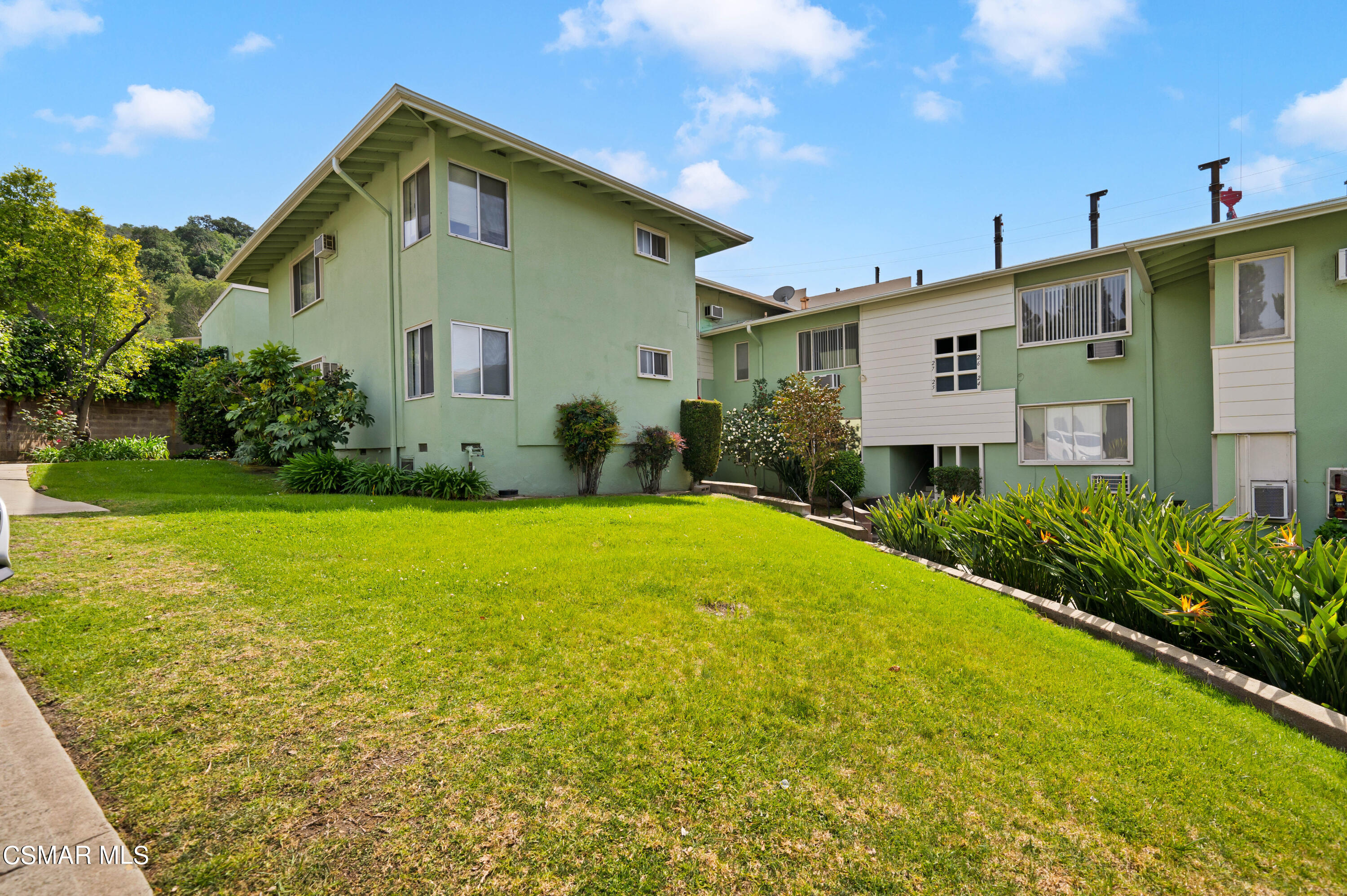 1550 North Verdugo Road Glendale, CA 91208 - Photo 35 of 61 a front view of house with yard and green space