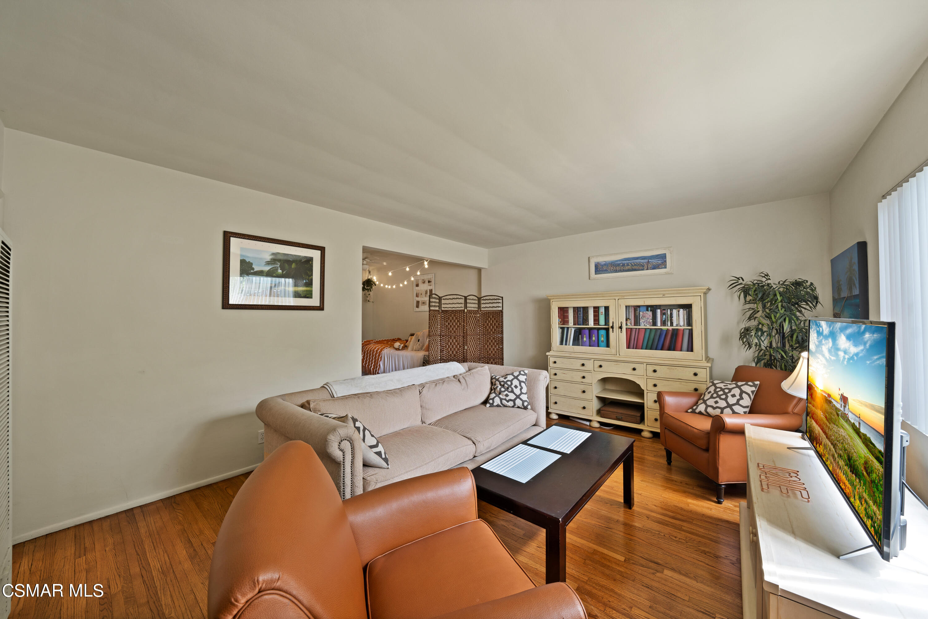 1550 North Verdugo Road Glendale, CA 91208 - Photo 39 of 61 a living room with furniture a flat screen tv and a table