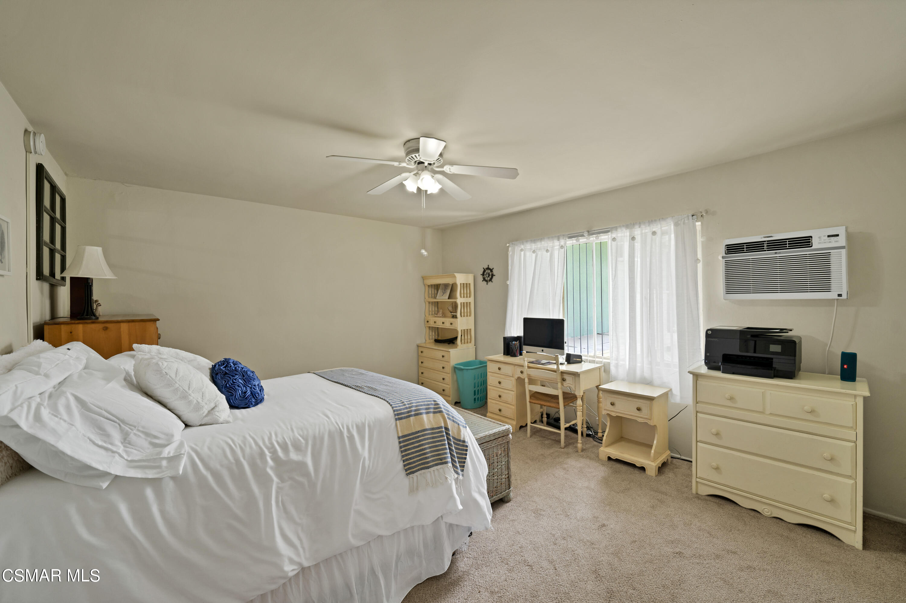 1550 North Verdugo Road Glendale, CA 91208 - Photo 49 of 61 a bedroom with a bed and a chandelier