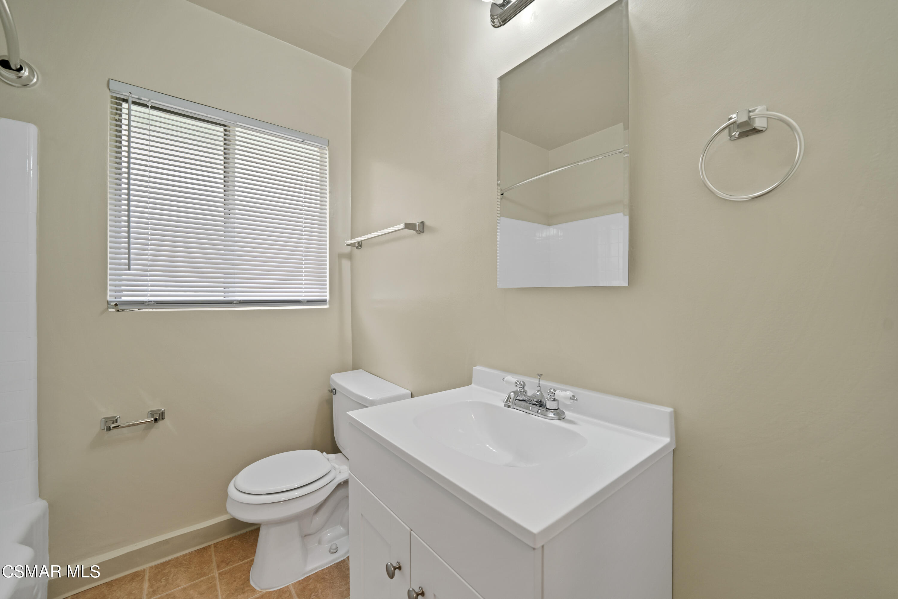 1550 North Verdugo Road Glendale, CA 91208 - Photo 60 of 61 a bathroom with a sink a toilet and a mirror