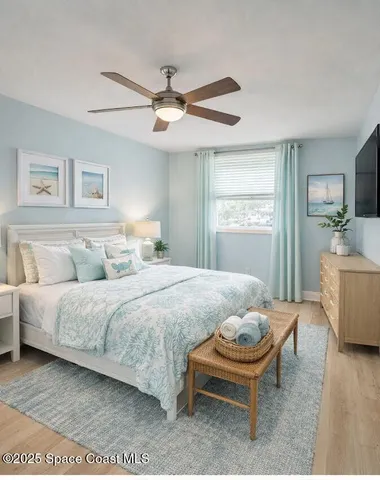 a spacious bedroom with a bed and a table