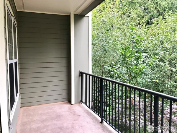 a balcony with an outdoor space