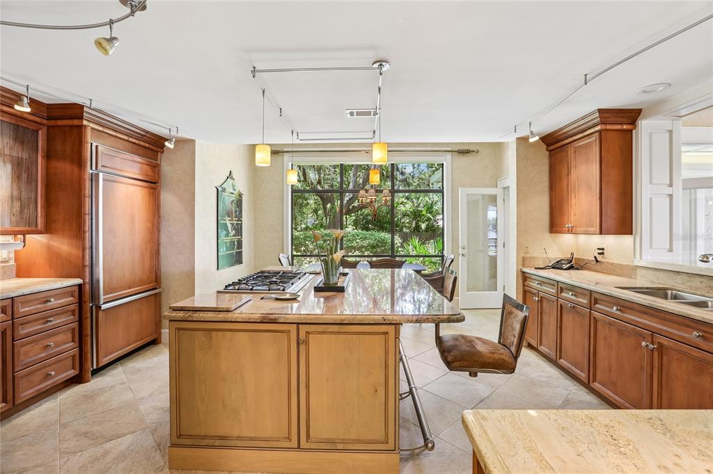 17810 Crawley Road Odessa, FL 33556 - Photo 16 of 76 a kitchen with sink refrigerator and window