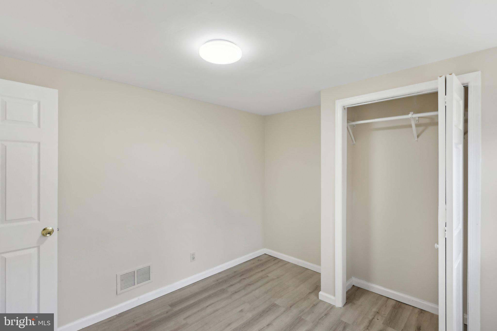 117 Susan Drive Jackson, NJ 08527 - Photo 13 of 43 a view of small space with wooden floor