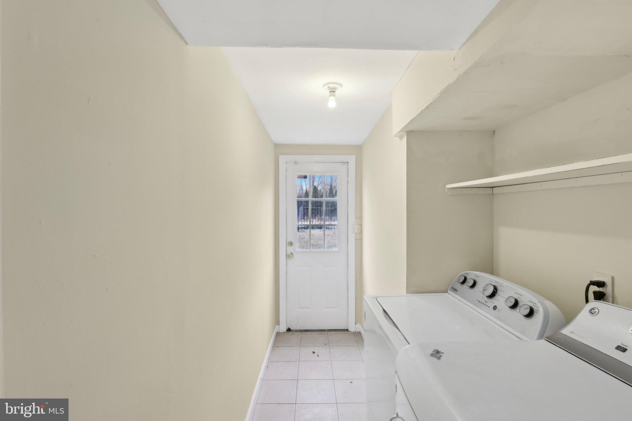 117 Susan Drive Jackson, NJ 08527 - Photo 20 of 43 a room with a baby crib and a dresser