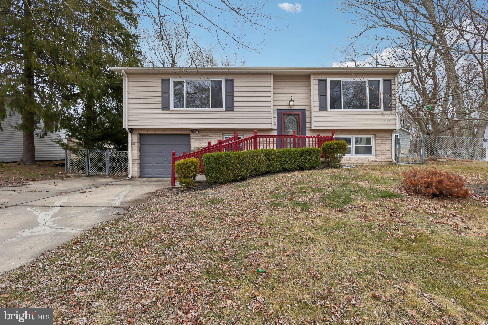 117 Susan Drive Jackson, NJ 08527 - Photo 2 of 43 a front view of house with yard