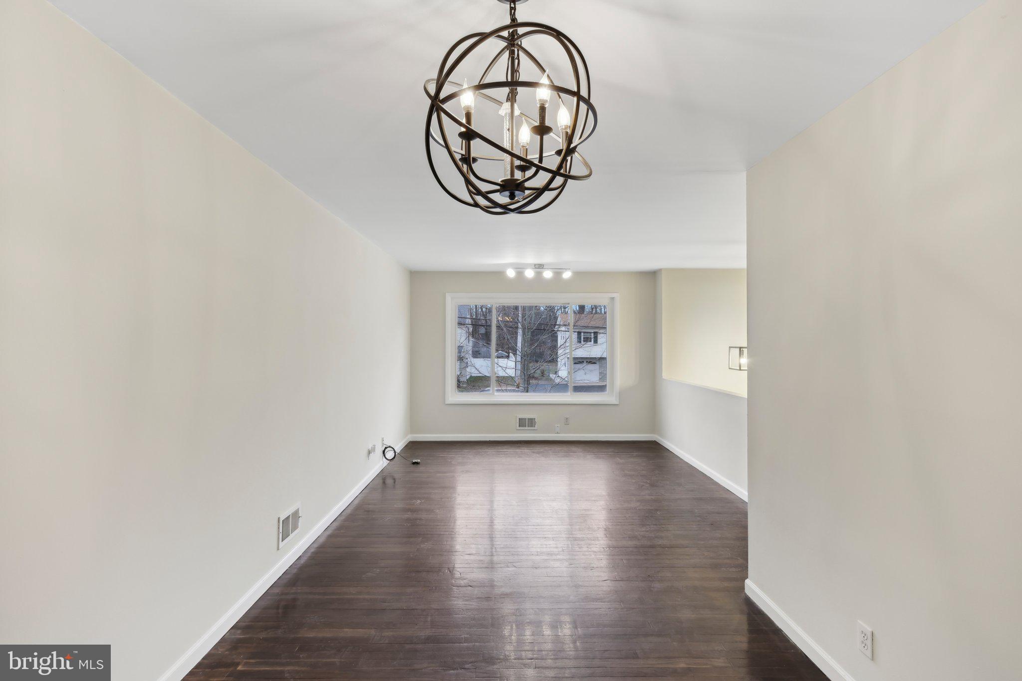 117 Susan Drive Jackson, NJ 08527 - Photo 23 of 43 a view of an entryway with wooden floor