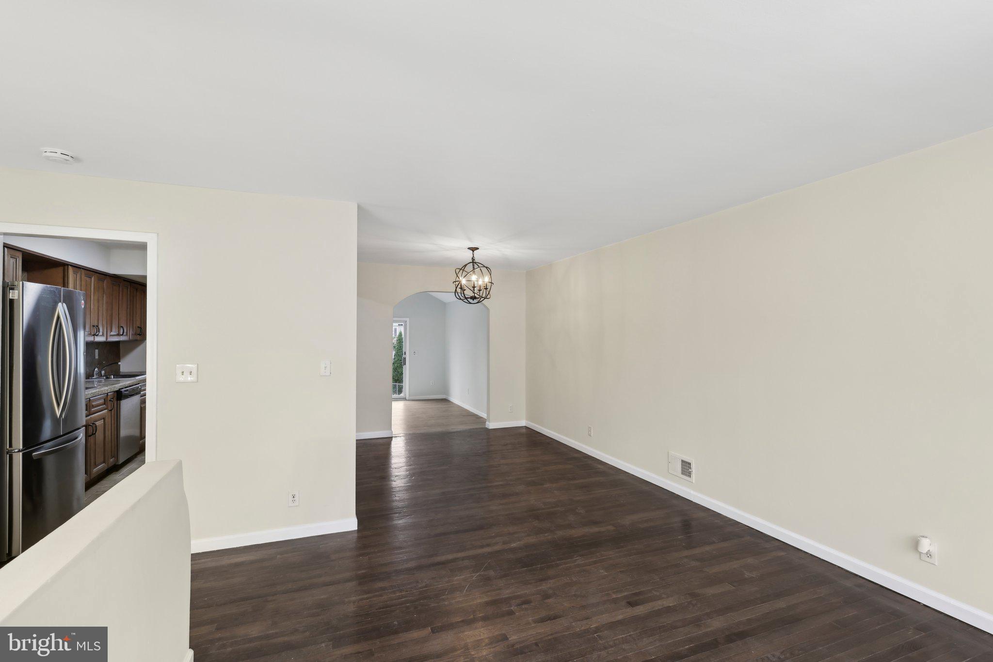 117 Susan Drive Jackson, NJ 08527 - Photo 24 of 43 a view of an empty room with wooden floor and a window