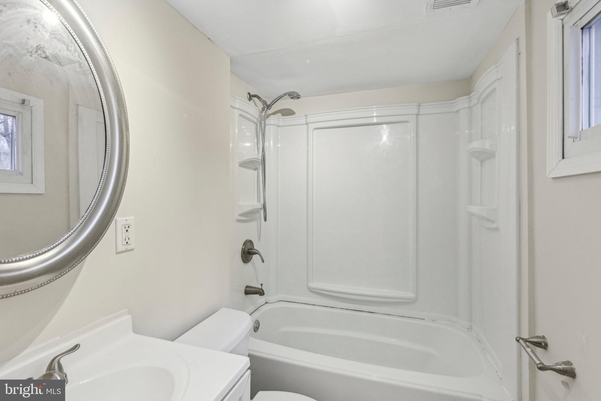 117 Susan Drive Jackson, NJ 08527 - Photo 27 of 43 a bathroom with a toilet and a shower