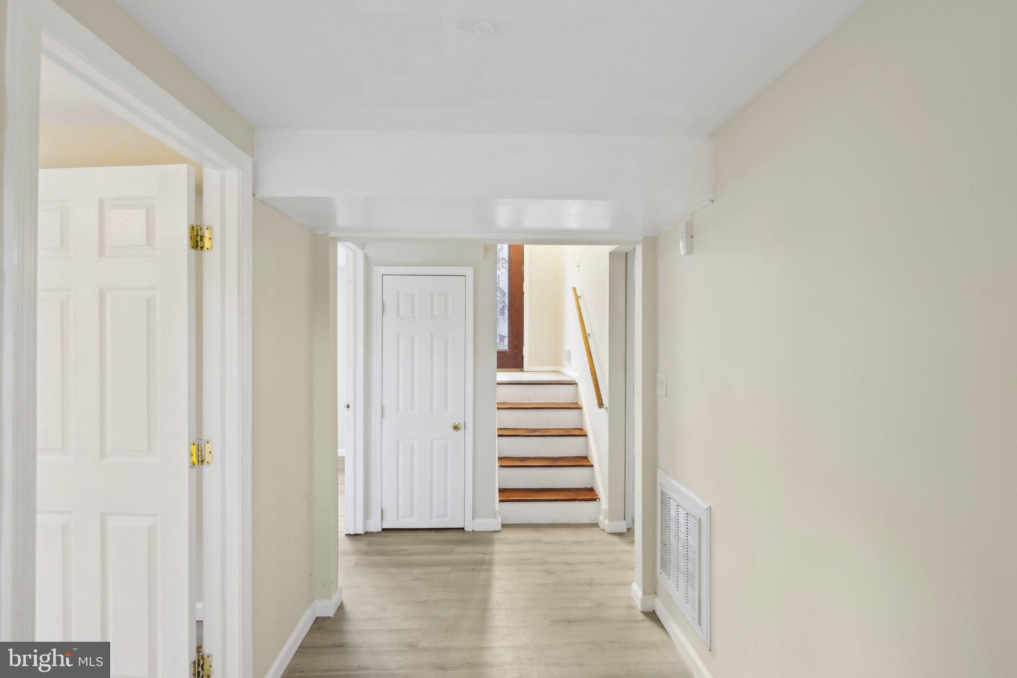 117 Susan Drive Jackson, NJ 08527 - Photo 28 of 43 a view of a hallway with stairs and stairs