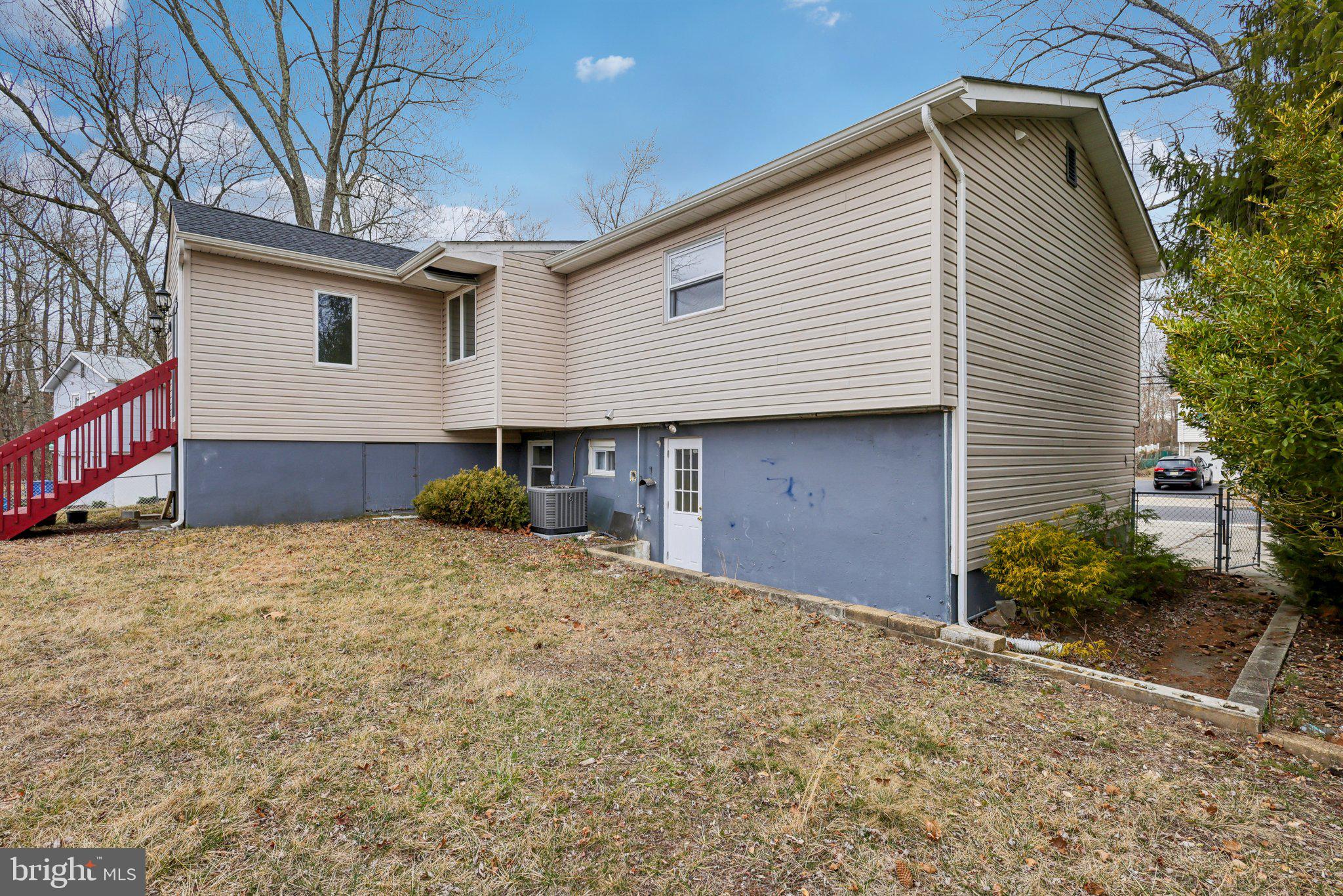 117 Susan Drive Jackson, NJ 08527 - Photo 35 of 43 a front view of a house with a yard