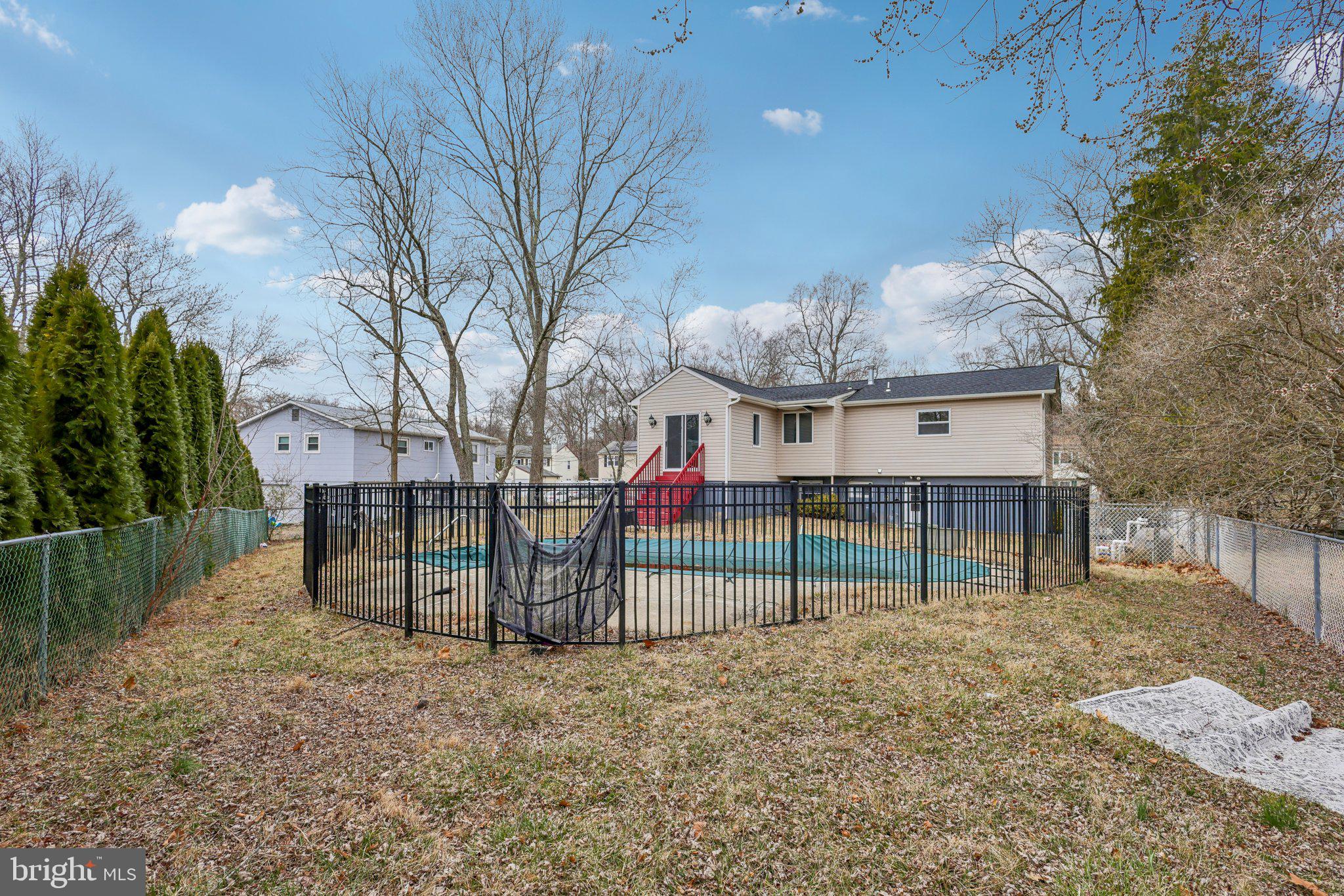 117 Susan Drive Jackson, NJ 08527 - Photo 36 of 43 a view of backyard with wooden fence