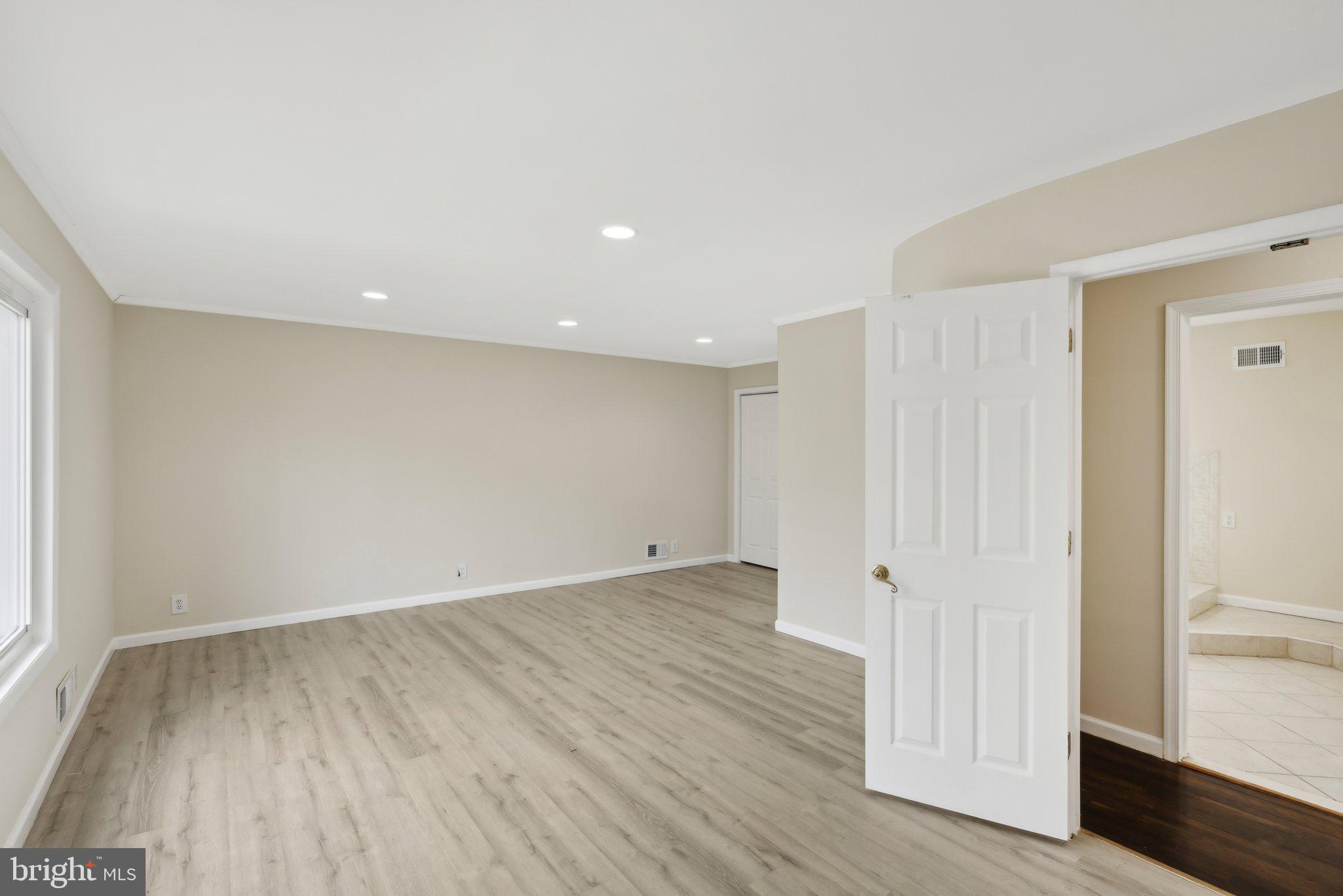 117 Susan Drive Jackson, NJ 08527 - Photo 5 of 43 wooden floor in an empty room with a window