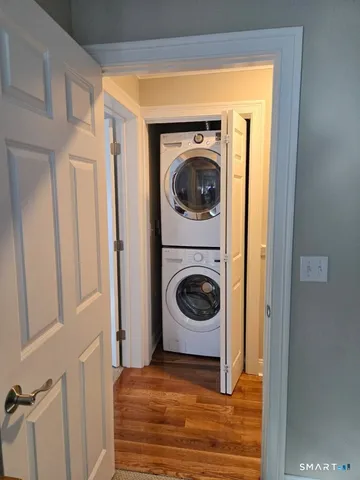 a view of a hallway with washer and dryer