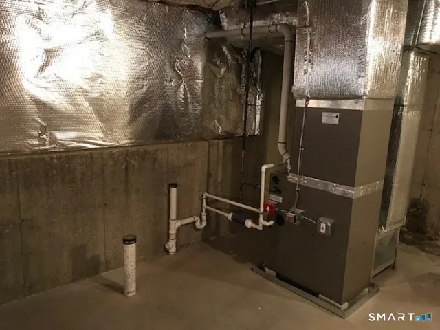 a view of a room with wooden door