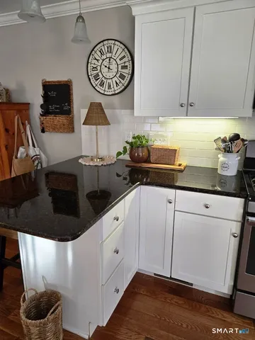 a kitchen with a cabinets and a stove