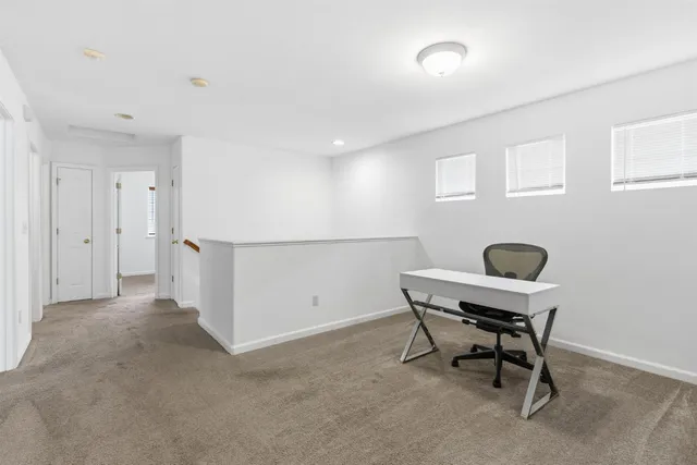 an empty room with a bathroom