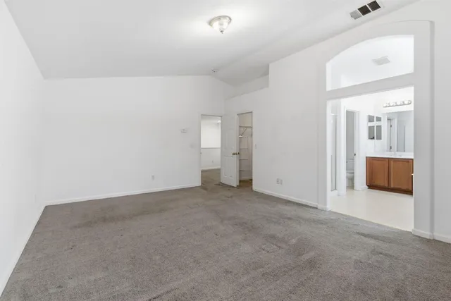 a bathroom with a bathtub and a sink