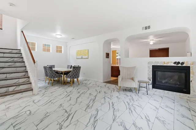 a view of livingroom with furniture and stairs