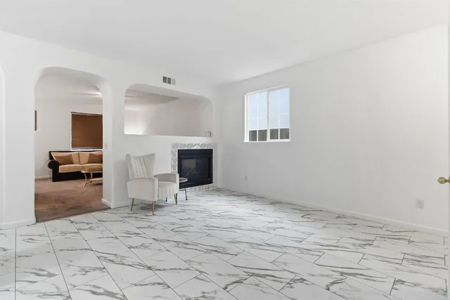 a view of a dining room with furniture