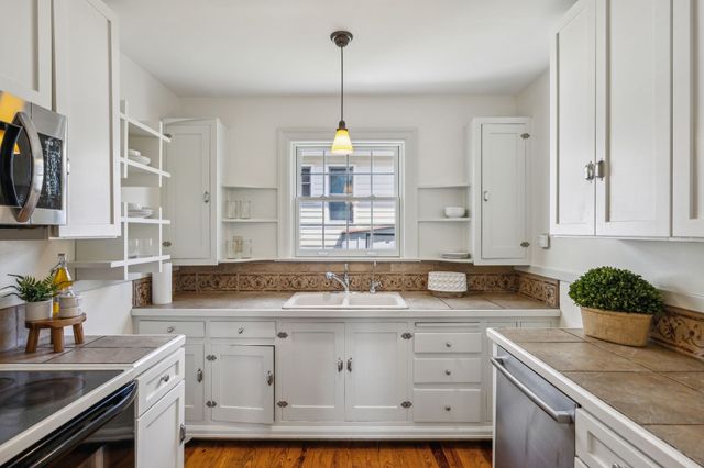 a view of livingroom with furniture and wooden floor