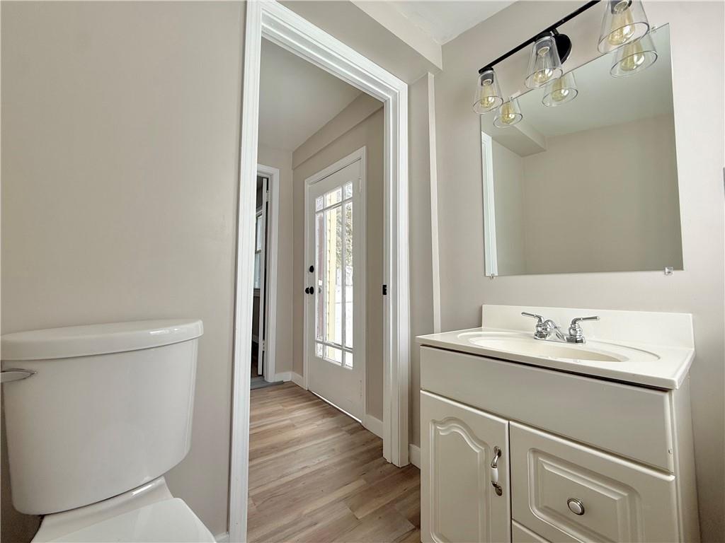 570 High Street Conneaut Lake, PA 16316 - Photo 12 of 26 a bathroom with a sink a toilet a shower and a mirror