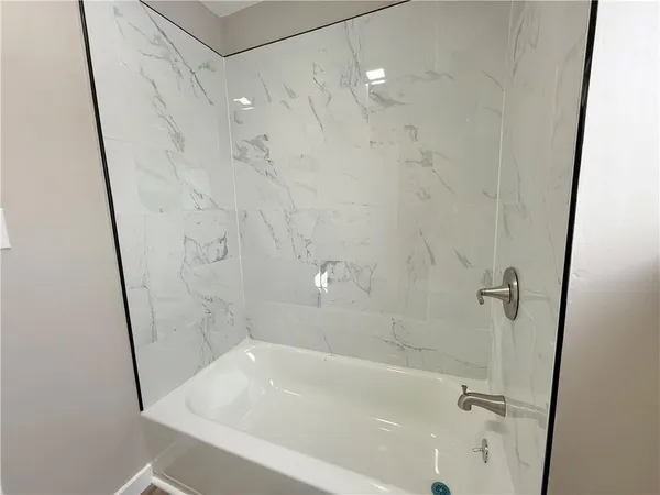 a bathroom with a bathtub