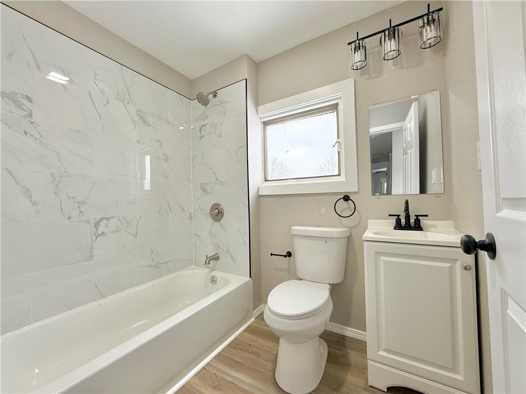 570 High Street Conneaut Lake, PA 16316 - Photo 19 of 26 a bathroom with a toilet sink and shower
