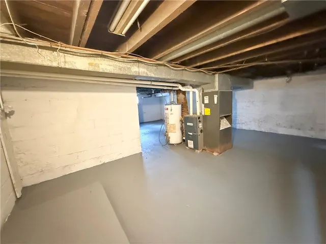 a view of a room with wooden walls