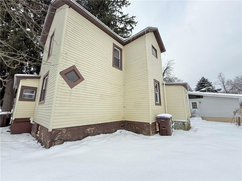 570 High Street Conneaut Lake, PA 16316 - Photo 25 of 26 a view of a house with a yard
