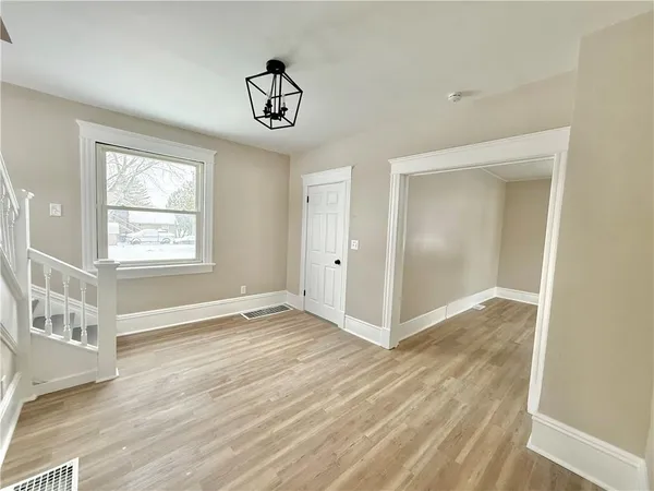 a view of an empty room and window