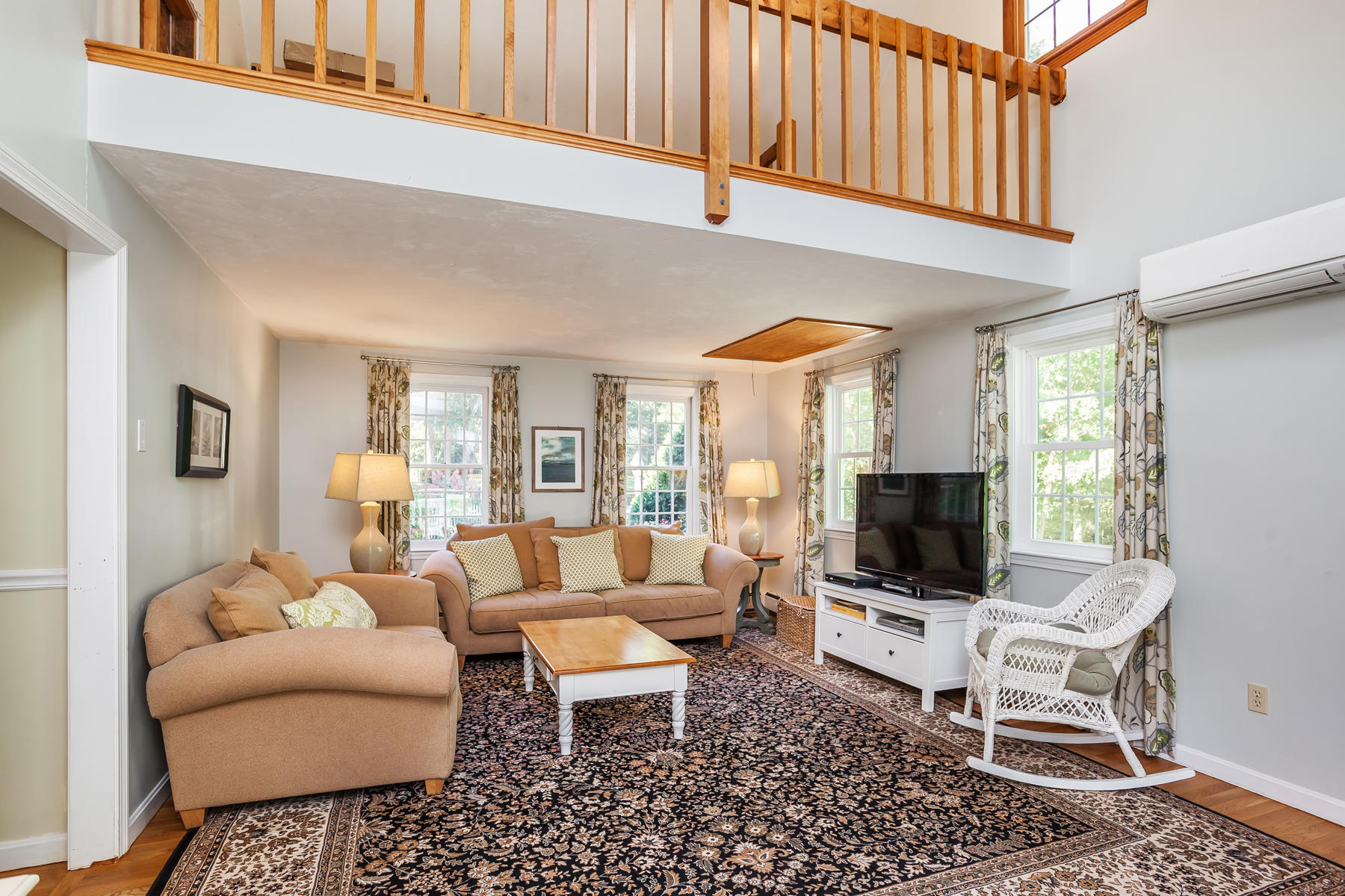 97 Shields Road Mashpee, MA 02649 - Photo 14 of 31 a living room with furniture a rug and a flat screen tv