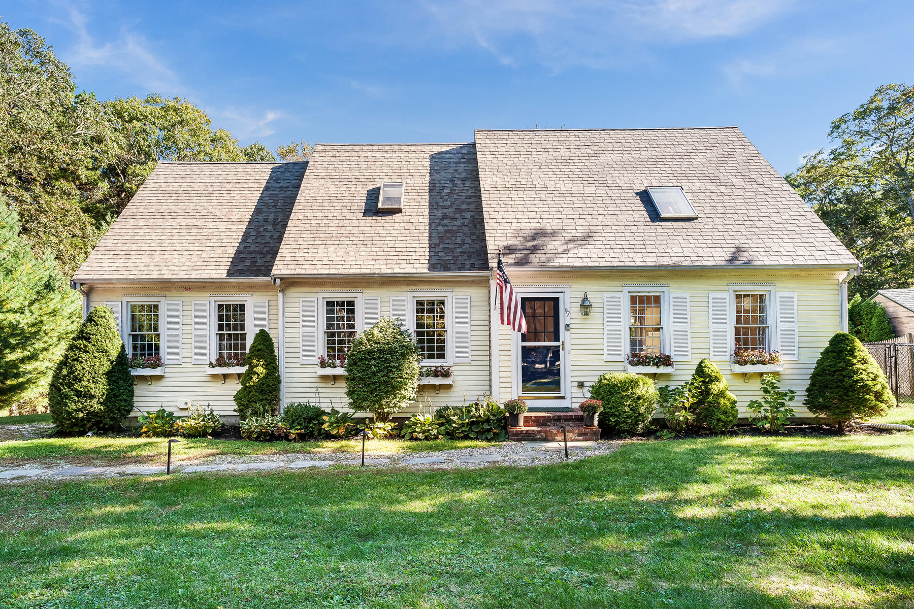 97 Shields Road Mashpee, MA 02649 - Photo 2 of 31 a front view of a house with a yard