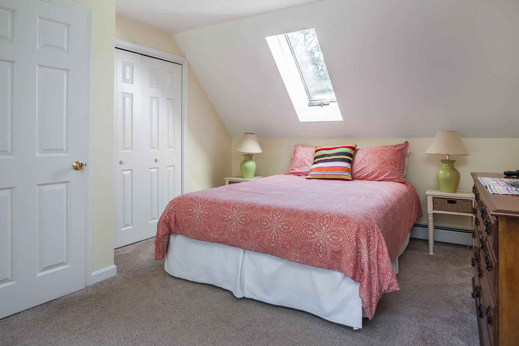 97 Shields Road Mashpee, MA 02649 - Photo 22 of 31 a spacious bedroom with a bed and a window