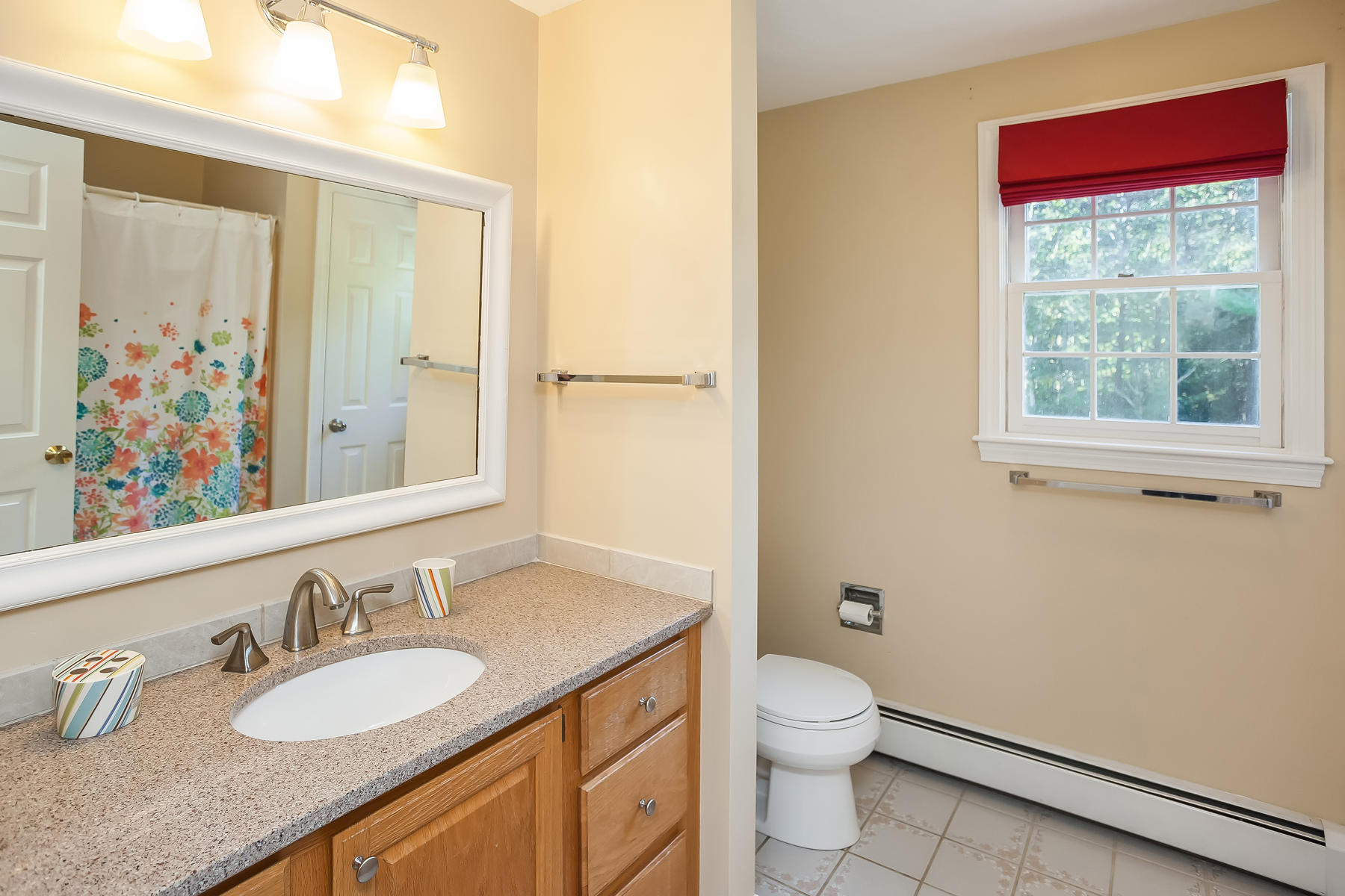 97 Shields Road Mashpee, MA 02649 - Photo 24 of 31 a bathroom with a granite countertop sink toilet a large mirror and shower