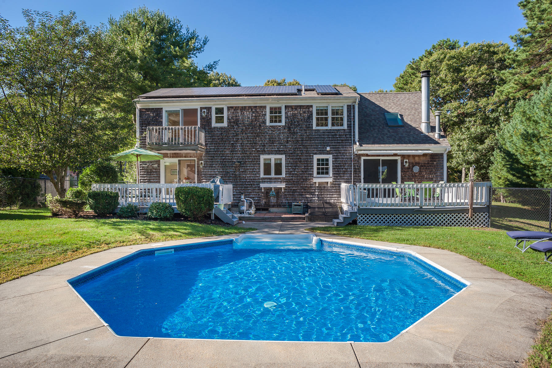 97 Shields Road Mashpee, MA 02649 - Photo 26 of 31 a view of a house with swimming pool yard