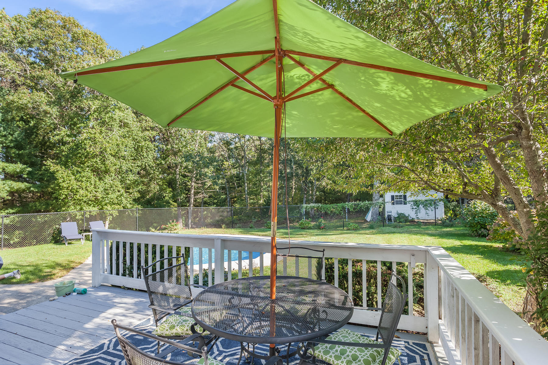 97 Shields Road Mashpee, MA 02649 - Photo 29 of 31 a view of a chair and table on the deck
