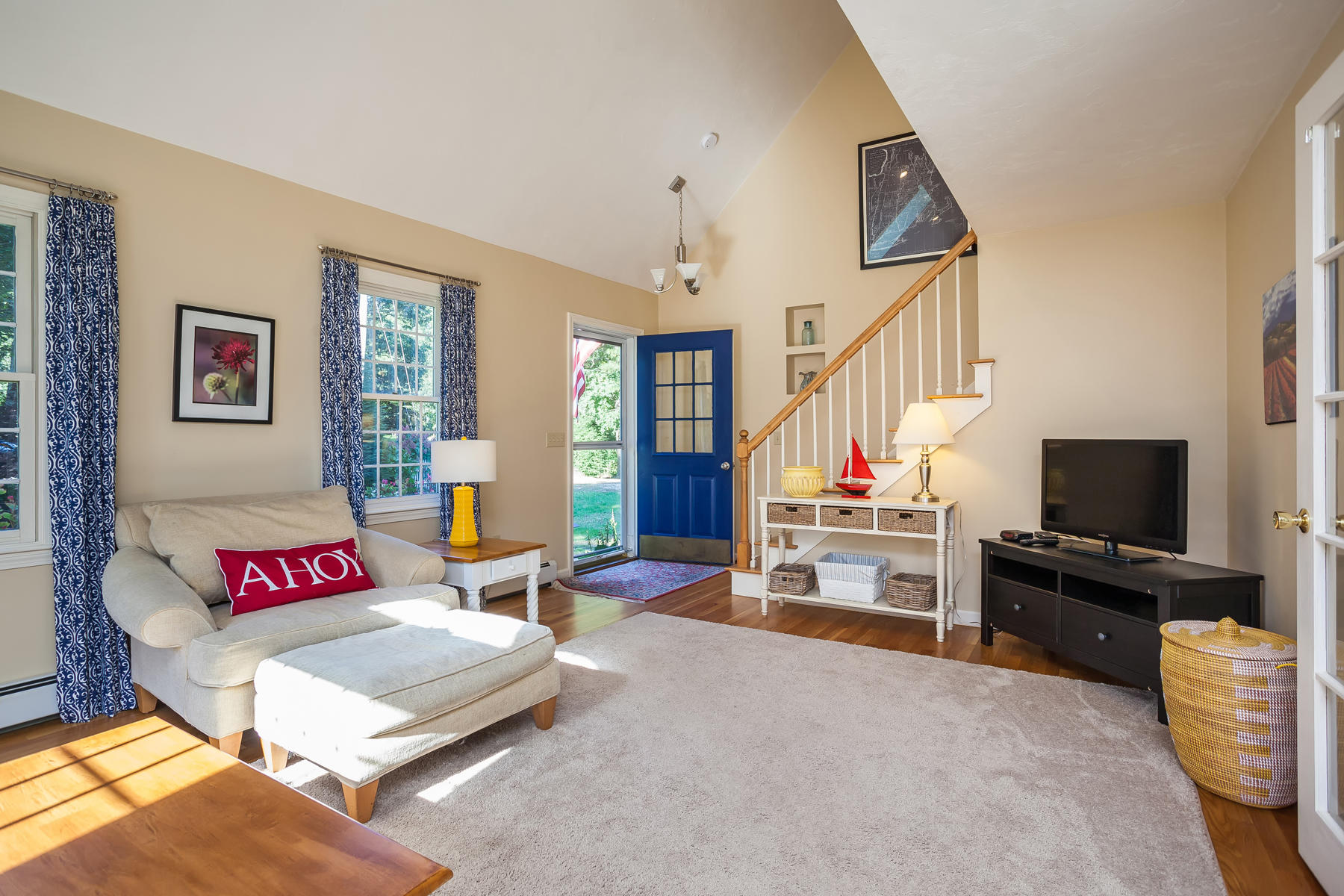 97 Shields Road Mashpee, MA 02649 - Photo 4 of 31 a living room with furniture and a flat screen tv